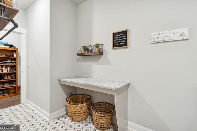 interior space with tile patterned floors