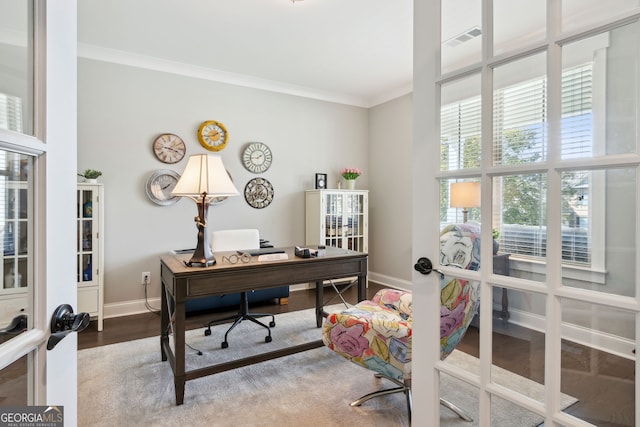 office area featuring french doors, baseboards, visible vents, wood finished floors, and crown molding