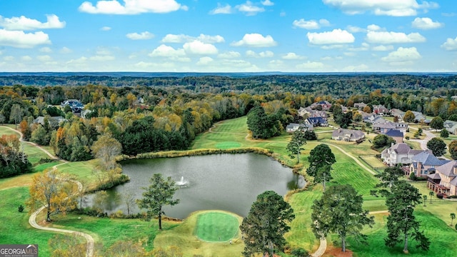 bird's eye view with a wooded view, a residential view, golf course view, and a water view