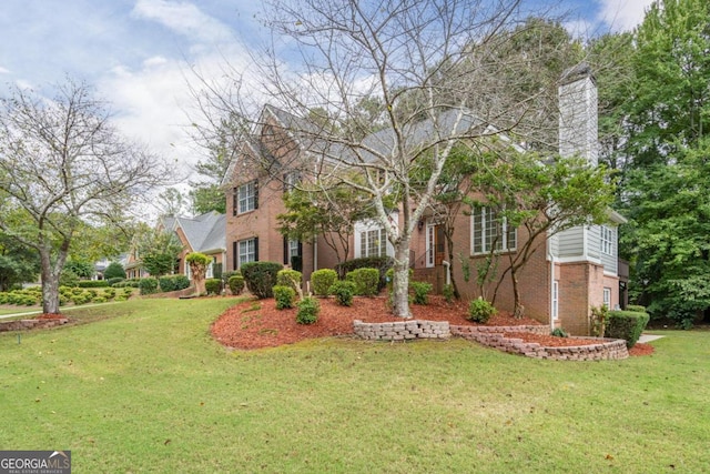 view of front of house with a front lawn