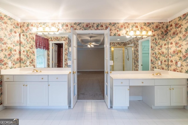 bathroom featuring vanity, ceiling fan, ornamental molding, and an enclosed shower