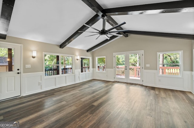 unfurnished living room with french doors, lofted ceiling with beams, ceiling fan, and dark wood-type flooring