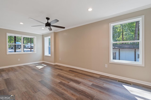 unfurnished room featuring ceiling fan, ornamental molding, and hardwood / wood-style flooring