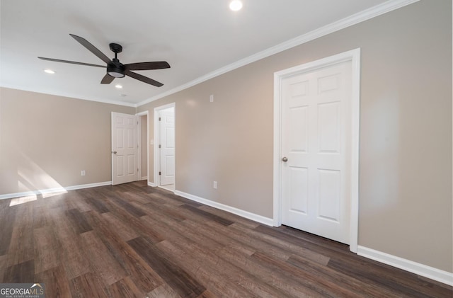 unfurnished bedroom with ceiling fan, crown molding, and dark wood-type flooring