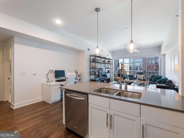 kitchen with sink, dishwasher, dark hardwood / wood-style flooring, pendant lighting, and white cabinets