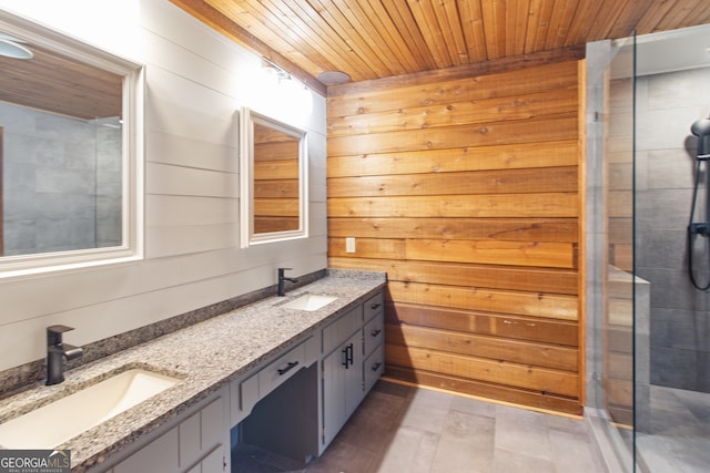 bathroom featuring vanity, wood walls, wooden ceiling, and a shower with door