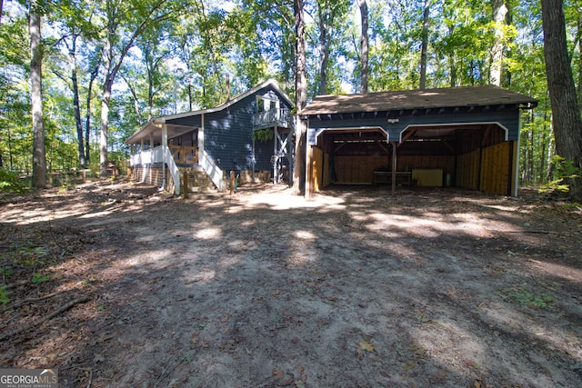 view of outbuilding featuring a garage