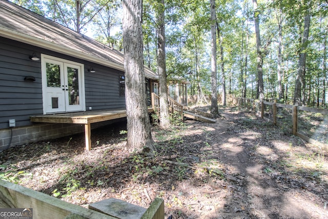 view of yard featuring french doors