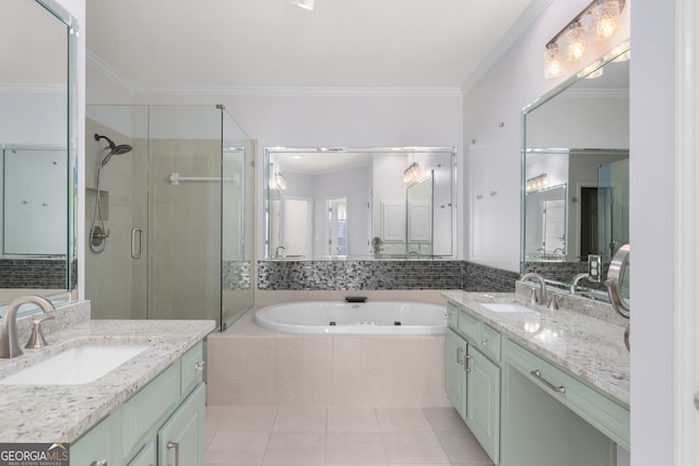 bathroom featuring vanity, ornamental molding, shower with separate bathtub, and tile patterned floors