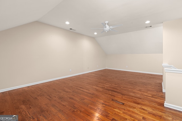 bonus room featuring lofted ceiling, hardwood / wood-style floors, and ceiling fan