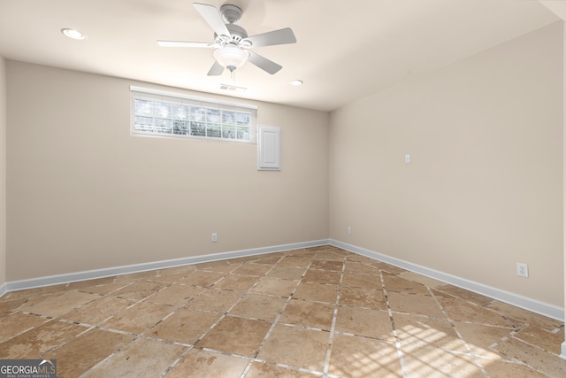 unfurnished room with ceiling fan