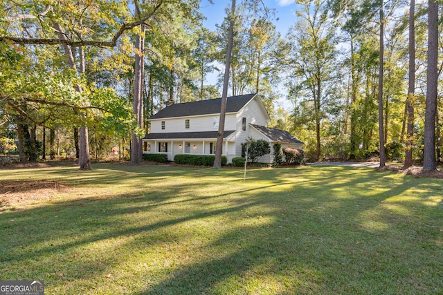 exterior space with a yard