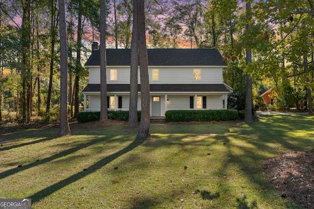 view of front of house with a front lawn