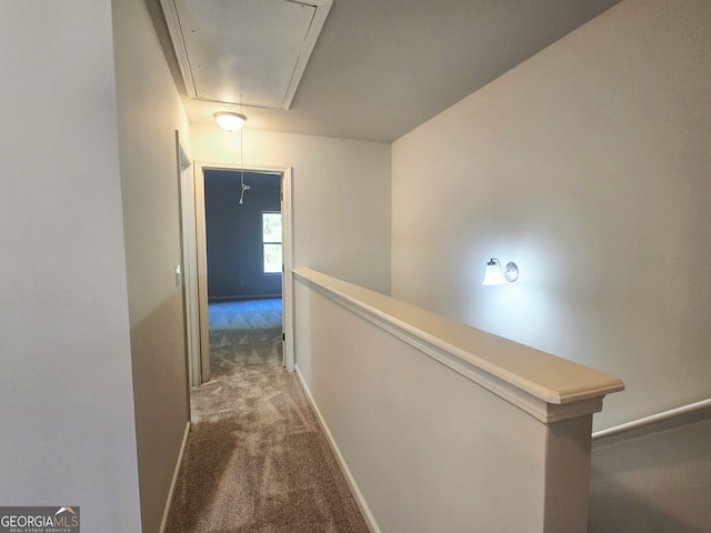 hallway featuring carpet flooring