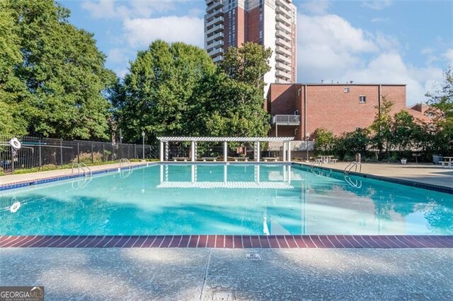 view of pool featuring a pergola