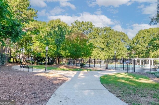 view of community featuring a swimming pool