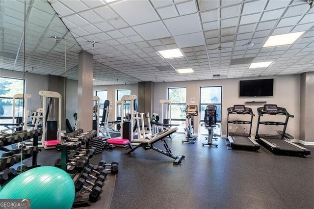 workout area with a drop ceiling