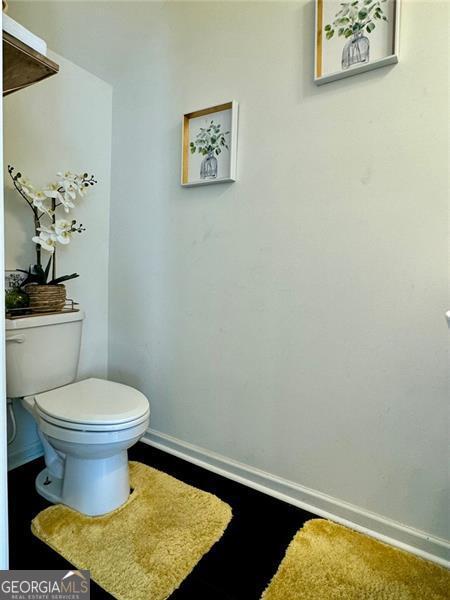 bathroom featuring toilet