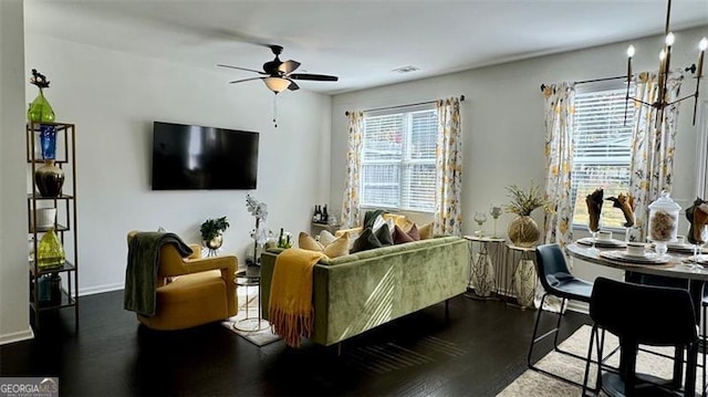 living room featuring ceiling fan and wood-type flooring