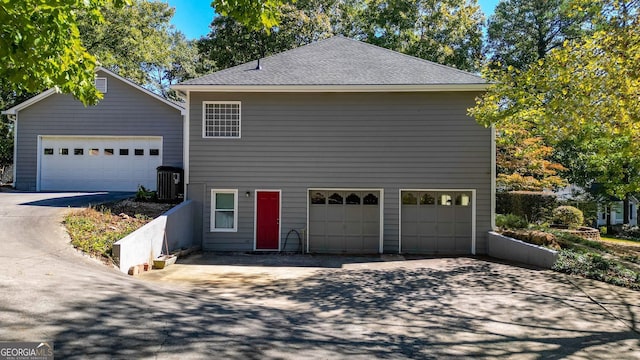 view of home's exterior with a garage