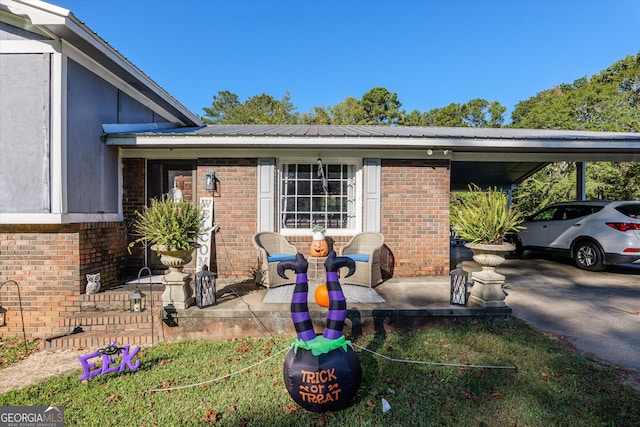 exterior space with a carport