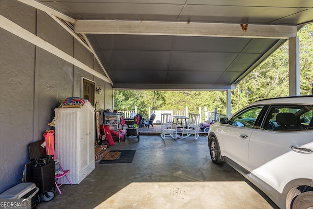 view of vehicle parking featuring a carport