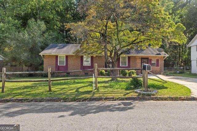 view of front of house with a front lawn