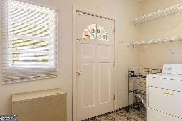 laundry room with washer / dryer