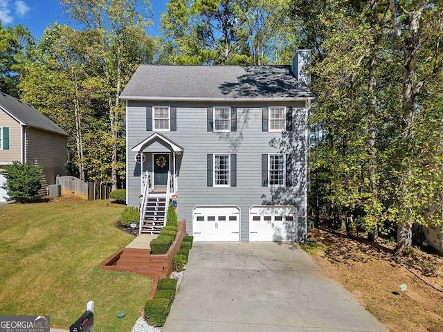 view of front facade with cooling unit, a front lawn, and a garage