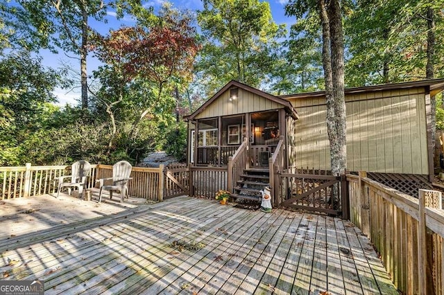 deck featuring a sunroom