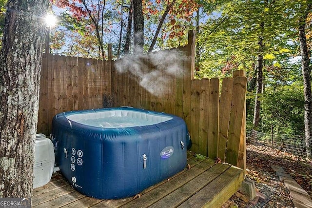 exterior space with a jacuzzi