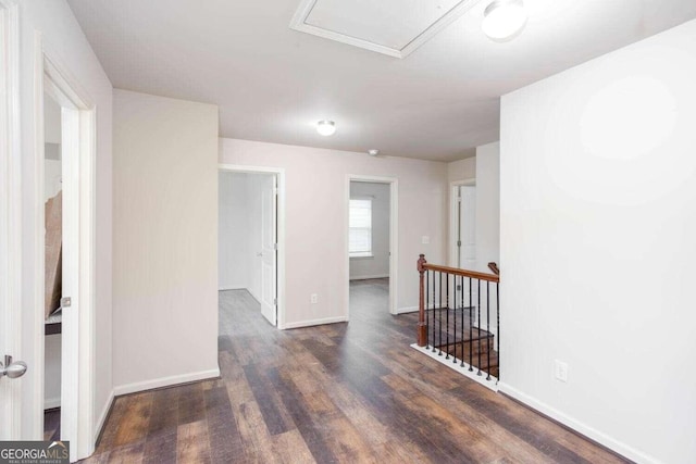 spare room featuring dark hardwood / wood-style flooring