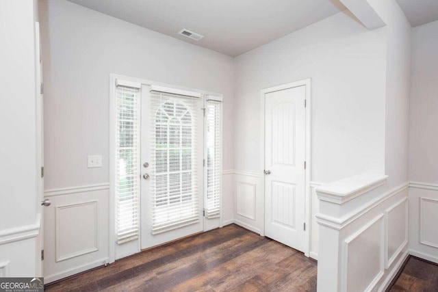 doorway to outside with dark wood-type flooring