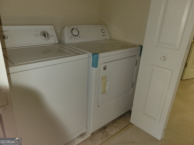 laundry room featuring independent washer and dryer