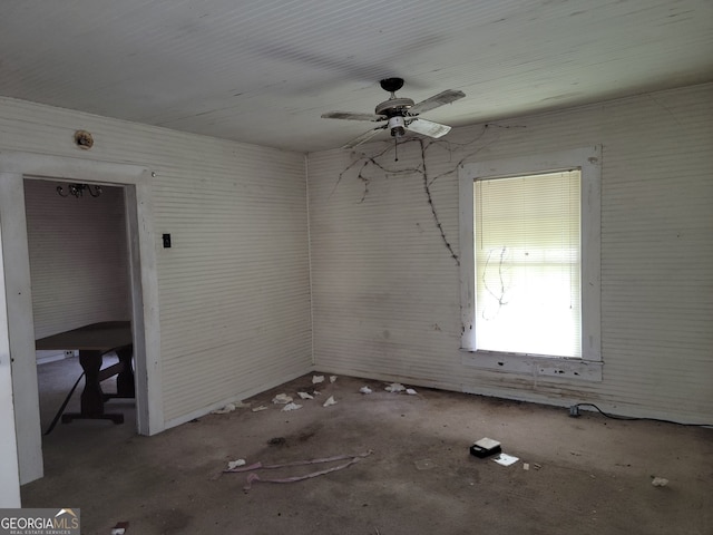 unfurnished room featuring ceiling fan