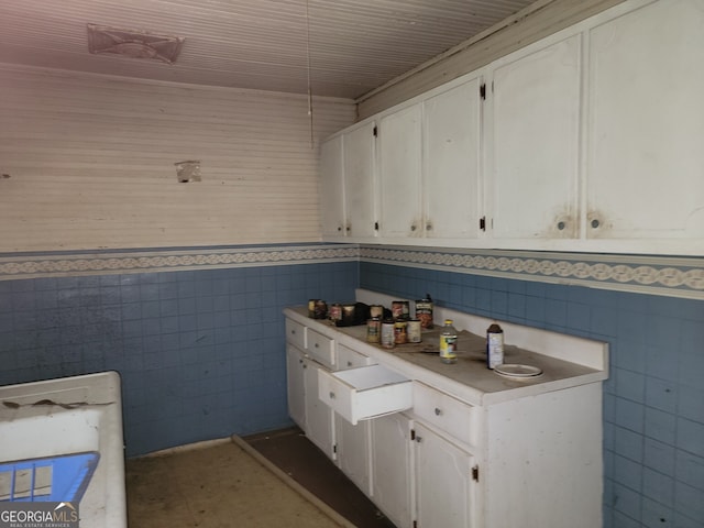 bathroom with tile walls