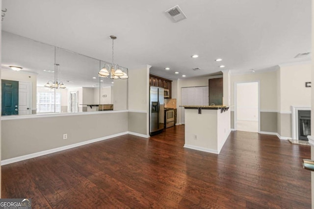 unfurnished living room with dark wood-type flooring