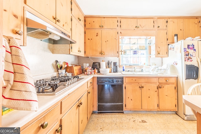 kitchen featuring stainless steel gas cooktop, white fridge with ice dispenser, black dishwasher, sink, and light brown cabinetry