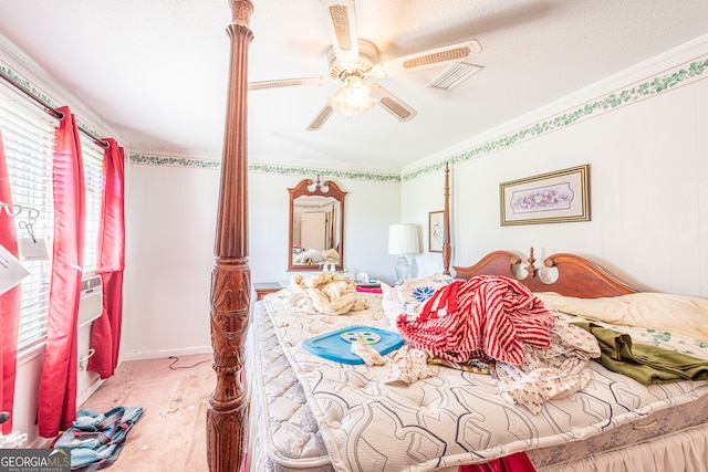 carpeted bedroom with multiple windows, ornamental molding, a textured ceiling, and ceiling fan