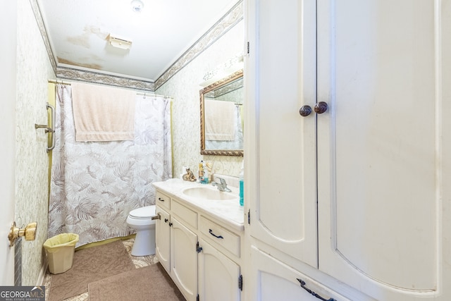 bathroom with curtained shower, toilet, vanity, crown molding, and tile patterned flooring