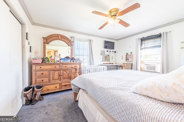 carpeted bedroom with cooling unit, ornamental molding, and ceiling fan