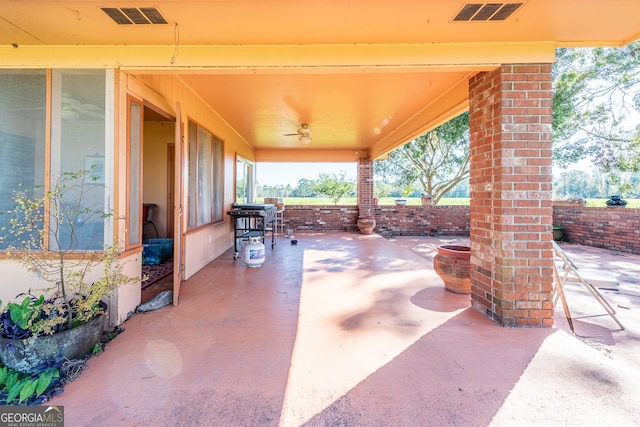 view of patio with ceiling fan