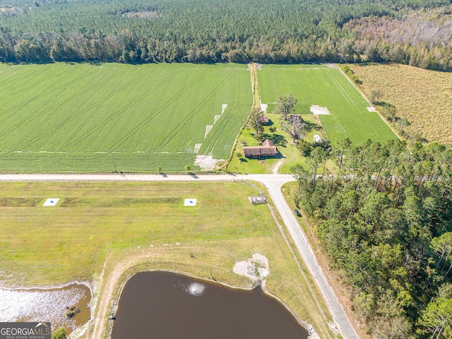 bird's eye view featuring a water view and a rural view