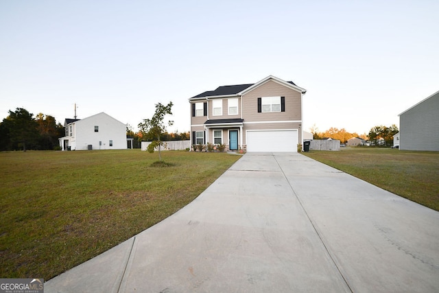 front facade with a front yard and a garage