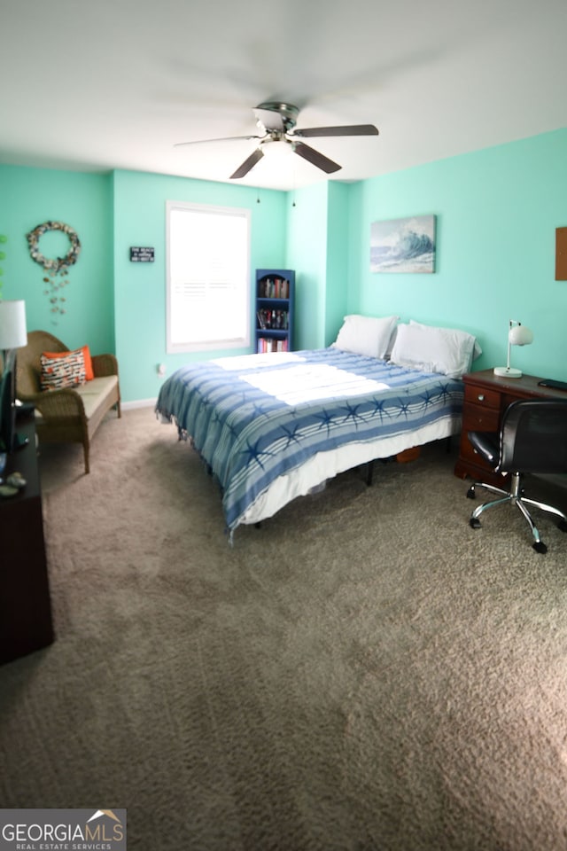 carpeted bedroom featuring ceiling fan