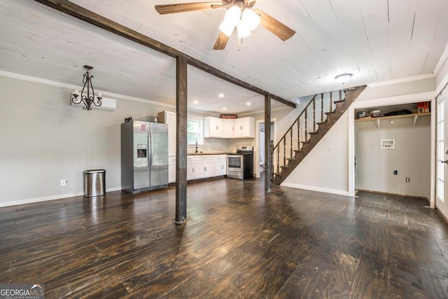 unfurnished living room featuring sink, dark wood-type flooring, ornamental molding, and ceiling fan