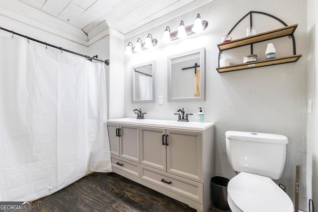 bathroom featuring wood ceiling, wood-type flooring, toilet, ornamental molding, and vanity