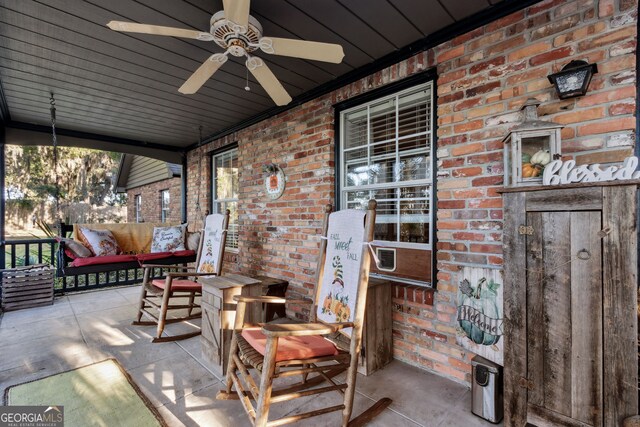 view of patio / terrace with covered porch and ceiling fan