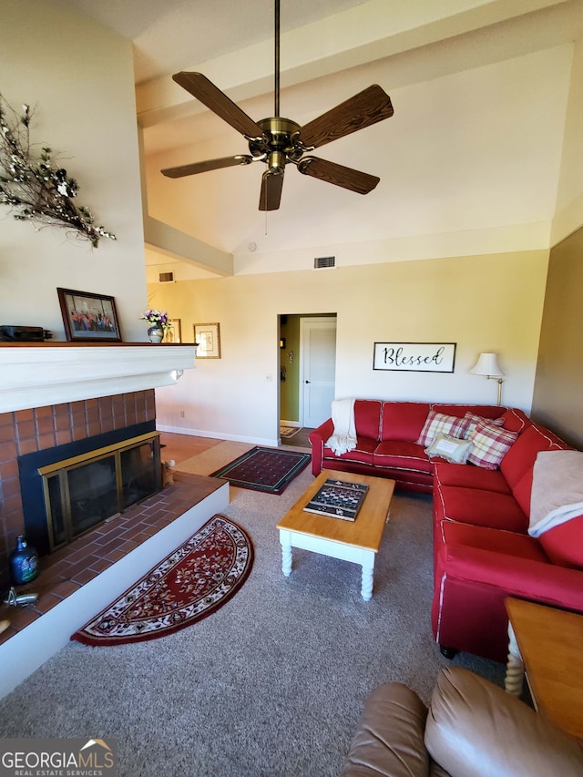 carpeted living room featuring a fireplace, high vaulted ceiling, and ceiling fan