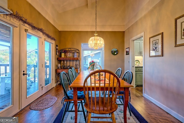 dining space featuring a chandelier and hardwood / wood-style flooring